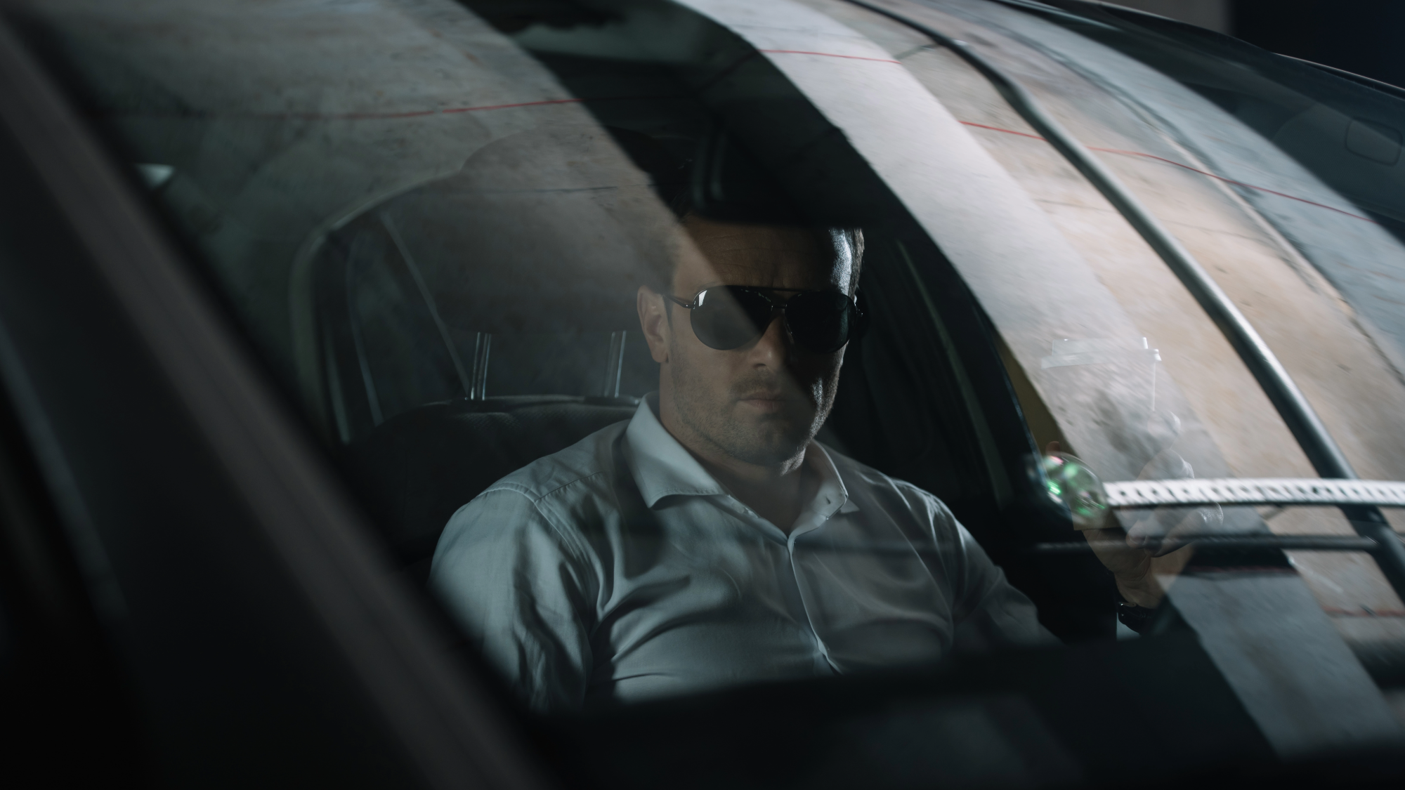 Investigator documenting surveillance activity and evidence